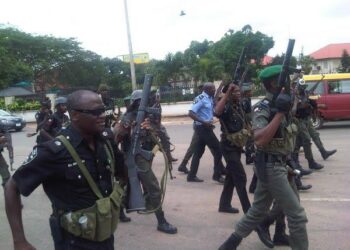BREAKING: Hoodlums Attack Policemen, Set Van Ablazed
