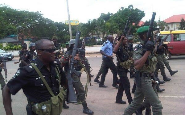 BREAKING: Hoodlums Attack Policemen, Set Van Ablazed
