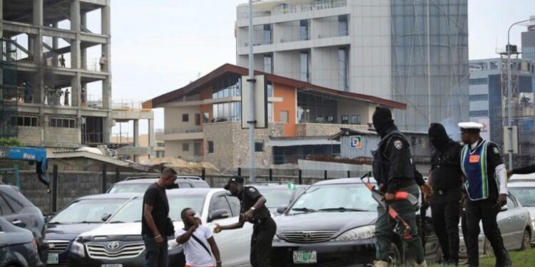 BREAKING: Police Beat Journalist At Lekki Tollgate (Video)