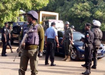 Drama As Police Arrest Nigerian Pastor And His Son In Abuja