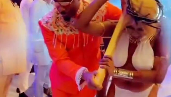 Drama As Pretty Mike Storms Wedding Ceremony With Ladies Depicting Story Of ‘Jesus’ Carrying The Cross