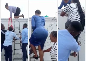 TRENDING VIDEO: Zenith Bank Staff Seen Fleeing Through The Fence As Customers Besiege Gate To Get Cash