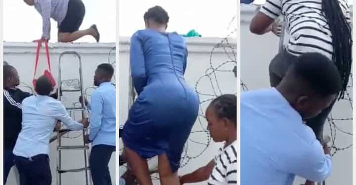TRENDING VIDEO: Zenith Bank Staff Seen Fleeing Through The Fence As Customers Besiege Gate To Get Cash