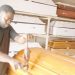 Meet Olushoto, Computer Engineering Graduate Who Turned Into A Coffin Maker