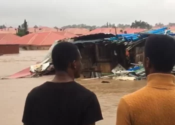 VIDEO: Residents Swim As Flood Takes Over Popular Abuja Estate