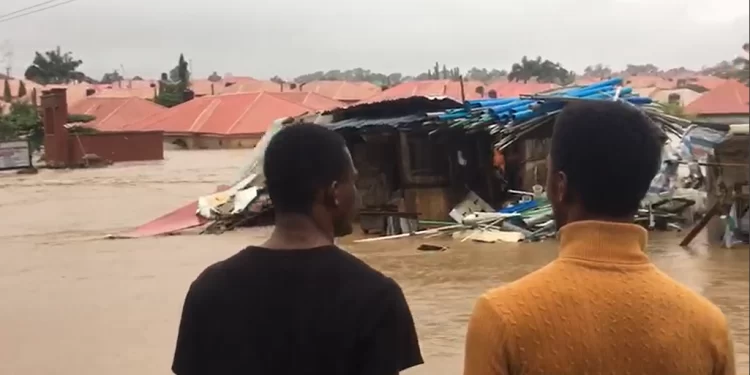 VIDEO: Residents Swim As Flood Takes Over Popular Abuja Estate