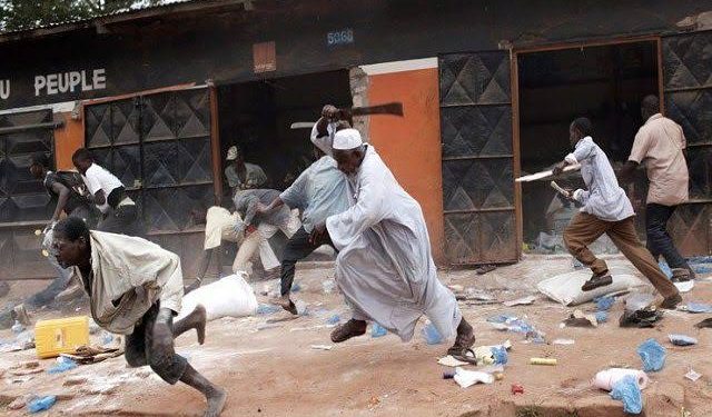 BREAKING: Gunshots As Nigerian Youths Loot Govt Properties Over Hardship
