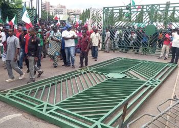 VIDEO: Angry NLC Protesters Break NASS Gate, Takeover Premises