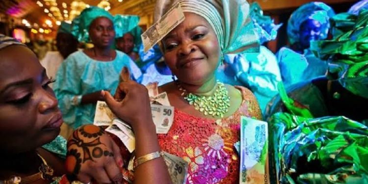 JUST IN: CBN Bans Naira Spraying In Nigeria