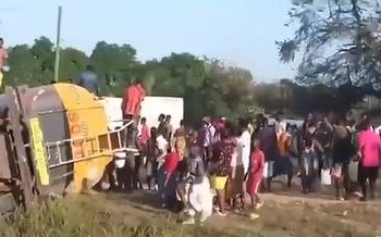 Residents Scoop Fuel From Fallen Tanker