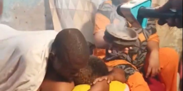 Ritual Being Carried Out For Cheating Lovers Stuck Together During Sex