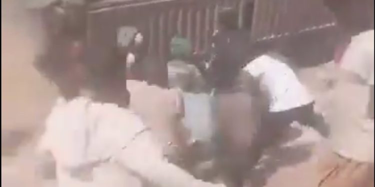 TRENDING VIDEO: Residents Attack Dangote's Trailer, Steal Food Items Amidst Gunshots From Soldiers