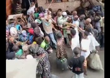 TRENDING VIDEO: Lagos Residents Flogged Mercilessly While Collecting Free Bread From Govt