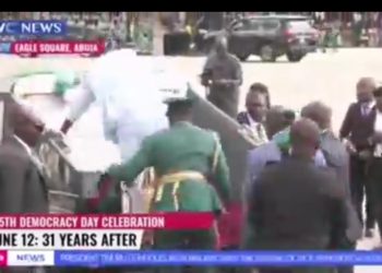 President Tinubu Falls While Climbing Parade Vehicle During Democracy Day Ceremony